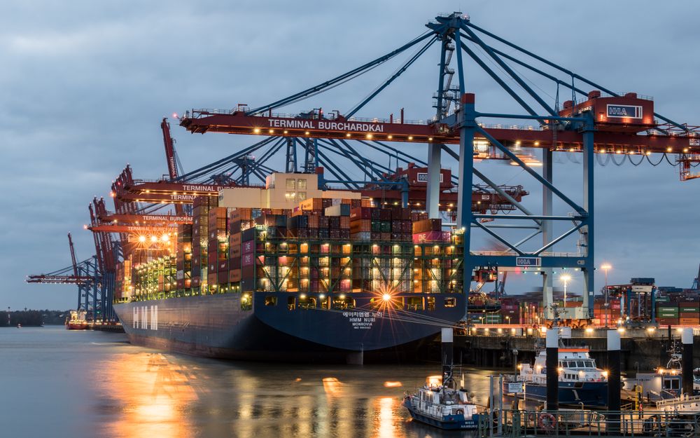 Shipping containers stacked at a port terminal