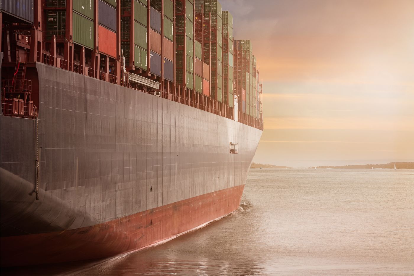 Cargo ship loaded with shipping containers at sea